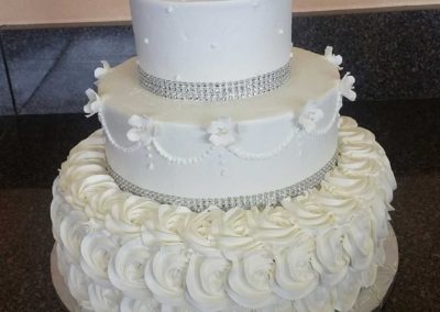 white frosted wedding cake